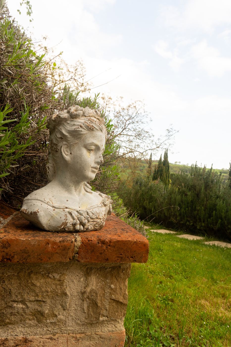 Bronze sculpture on the terrace overlooking the Tuscan valley