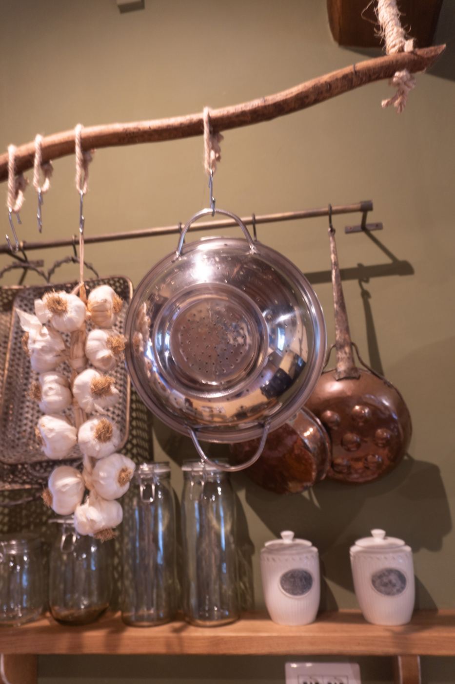 Copper pots hanging in the villa kitchen